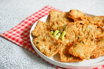 Memasak cepat tempe goreng tepung.