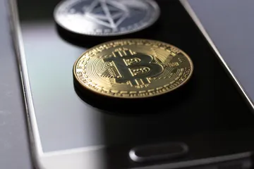 Ilustrasi Bitcoin dan altcoin.