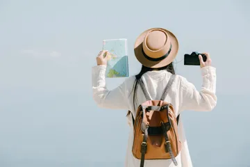 Tips menghemat uang saat liburan.