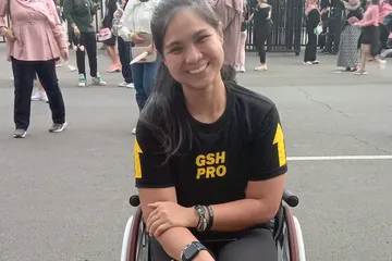 Johanna Caroline, salah seorang perempuan difabel yang bertanggung jawab sebagai usher konser BLACKPINK.